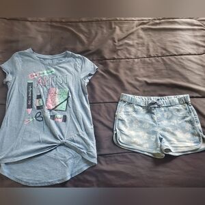 girl large graphic tee and shorts